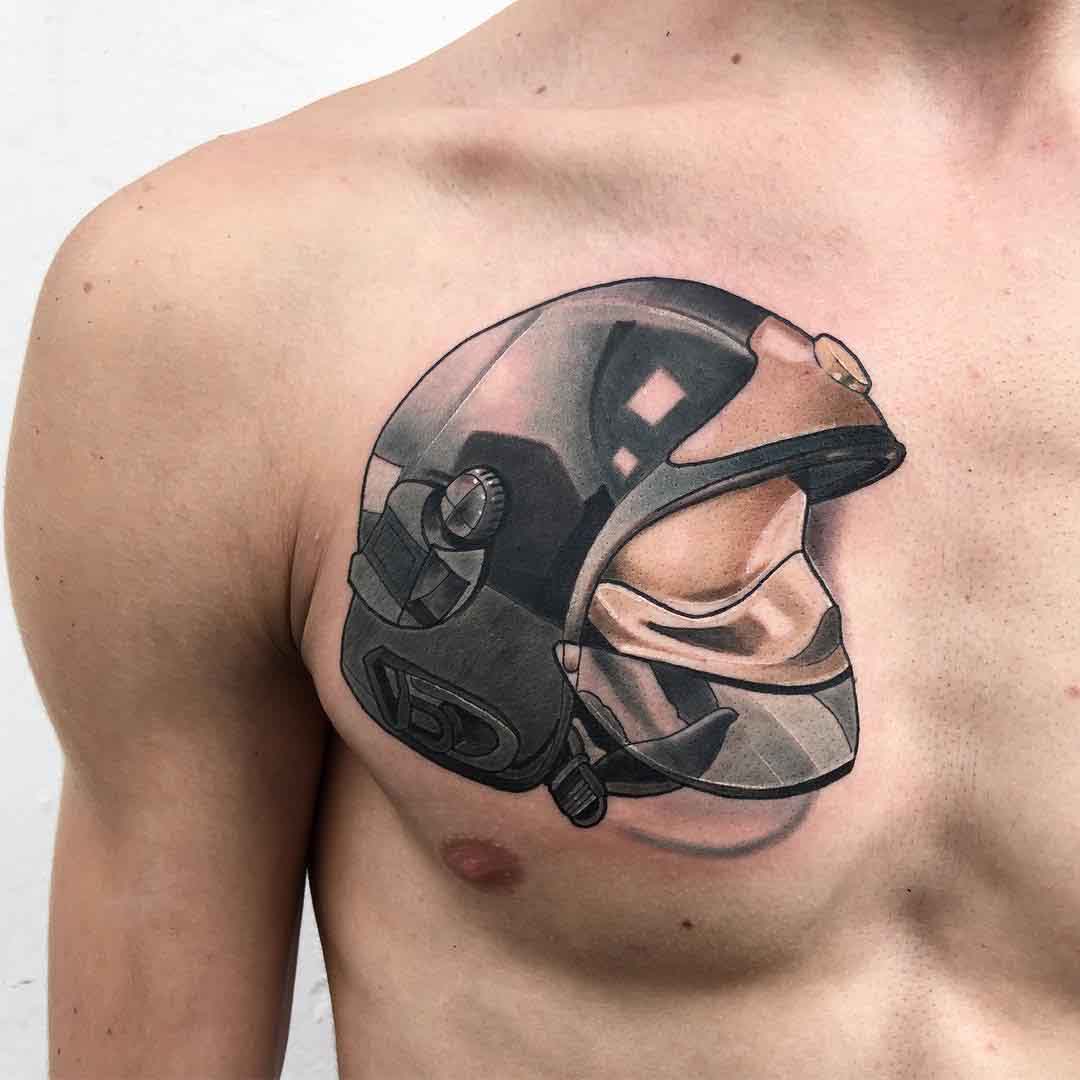 firefighter's helmet tattoo on chest