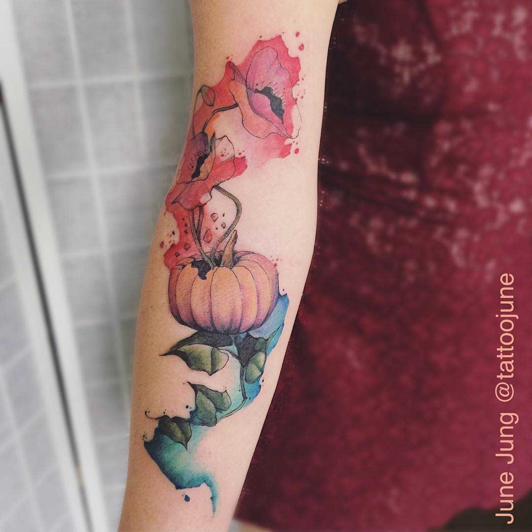 watercolor forearm tattoo poppy and pumpkin