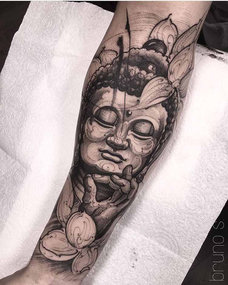 buddha tattoo on arm