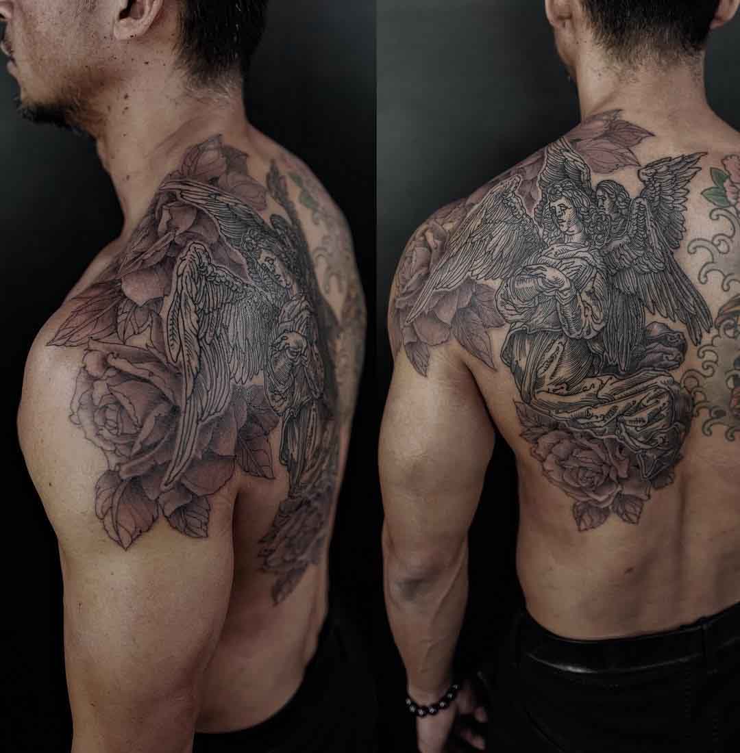 shoulder blade angels and roses tattoo