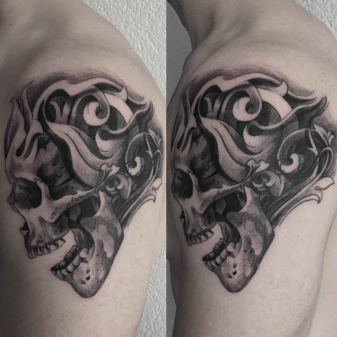 shoulder tattoo baroque skull