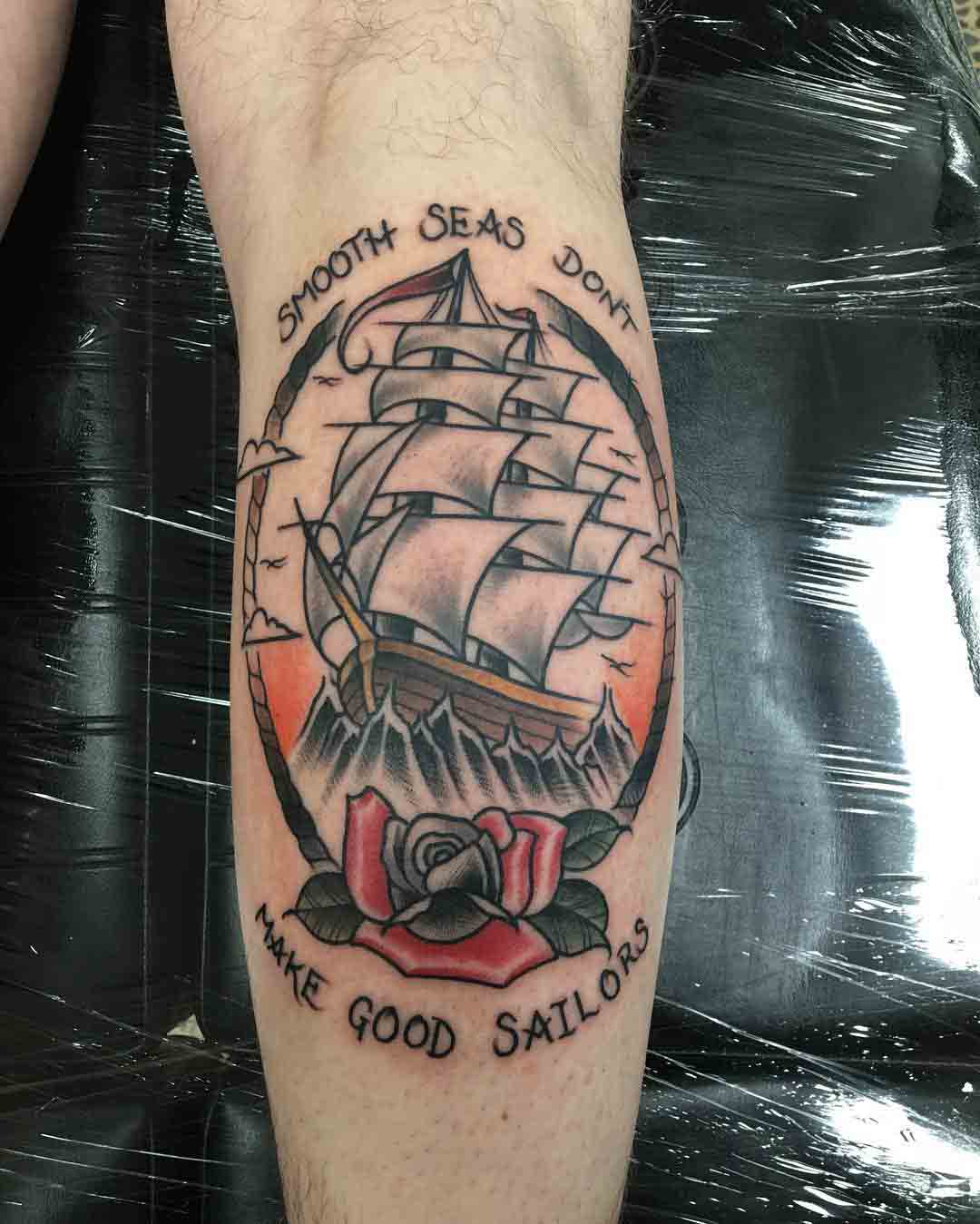 nautical tattoo on calf sailing ship