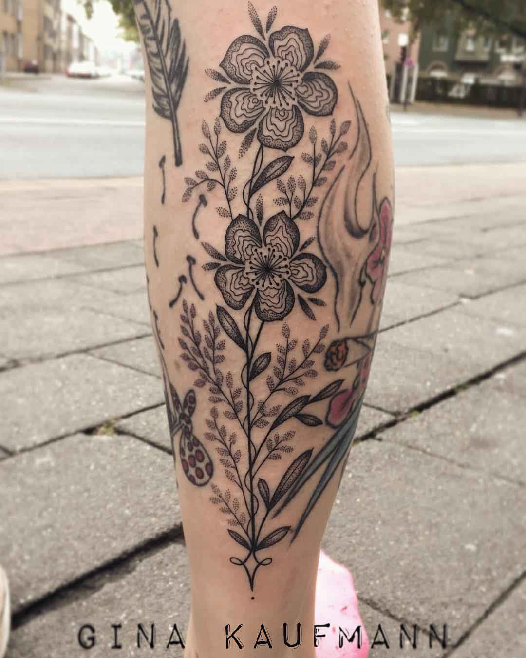 calf tattoo of flowers ornament floral