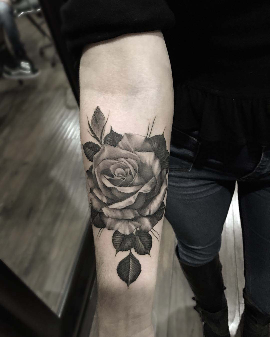arm tattoo rose black and grey