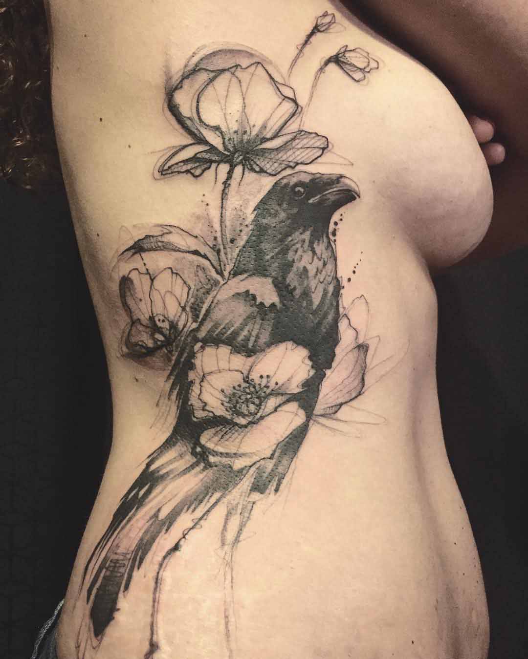 Crow tattoo for girl on torso side