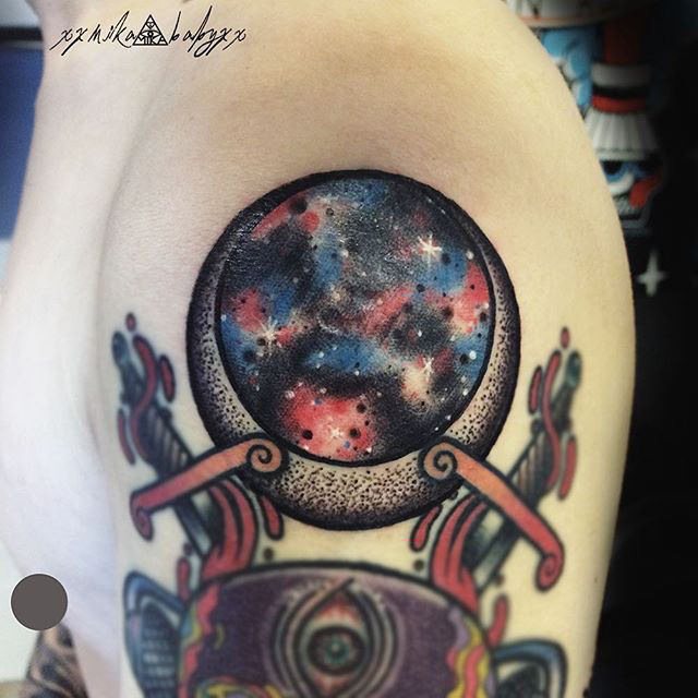 universe moon tattoo on shoulder