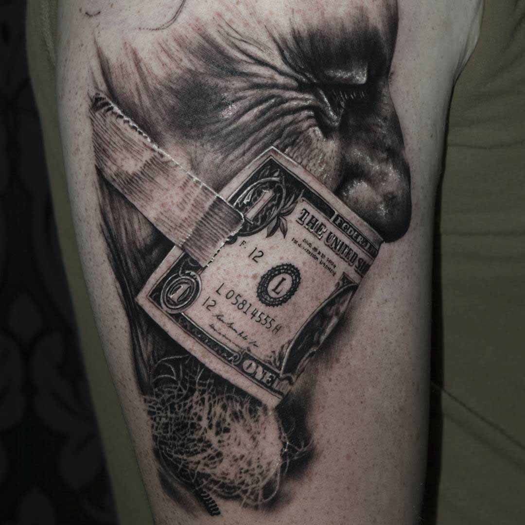 shoulder tattoo black and grey dollar