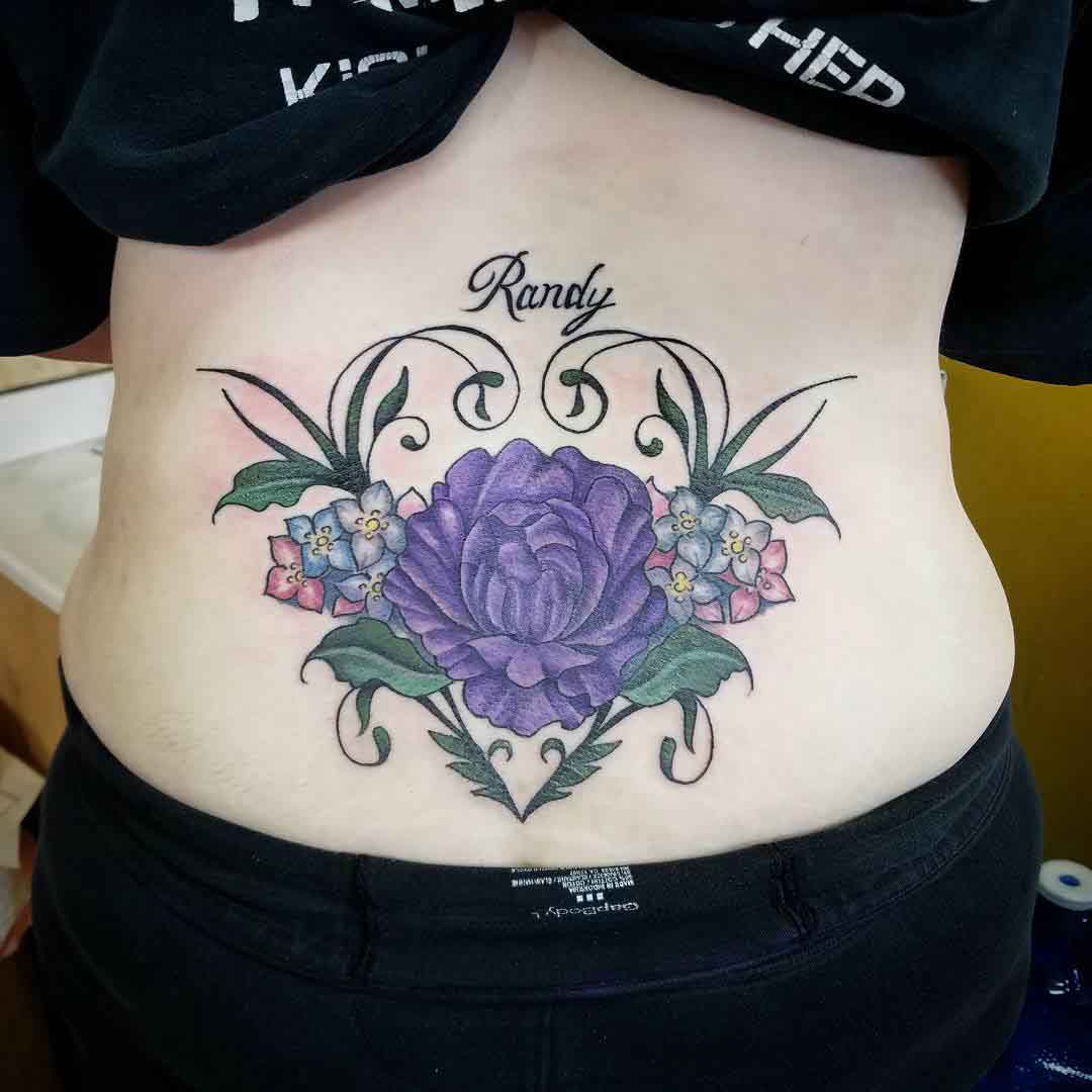 flower tattoo on lower back