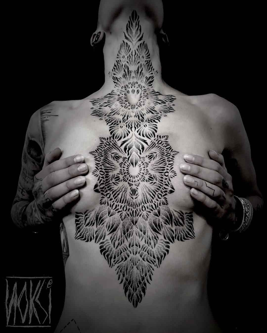 chest to nech geometric tattoo