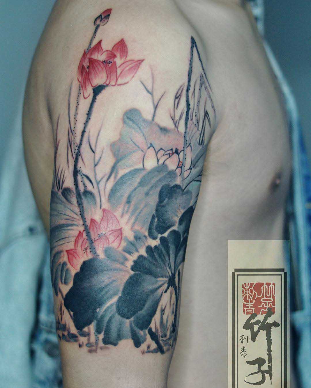 shoulder flowers tattoo pale colors