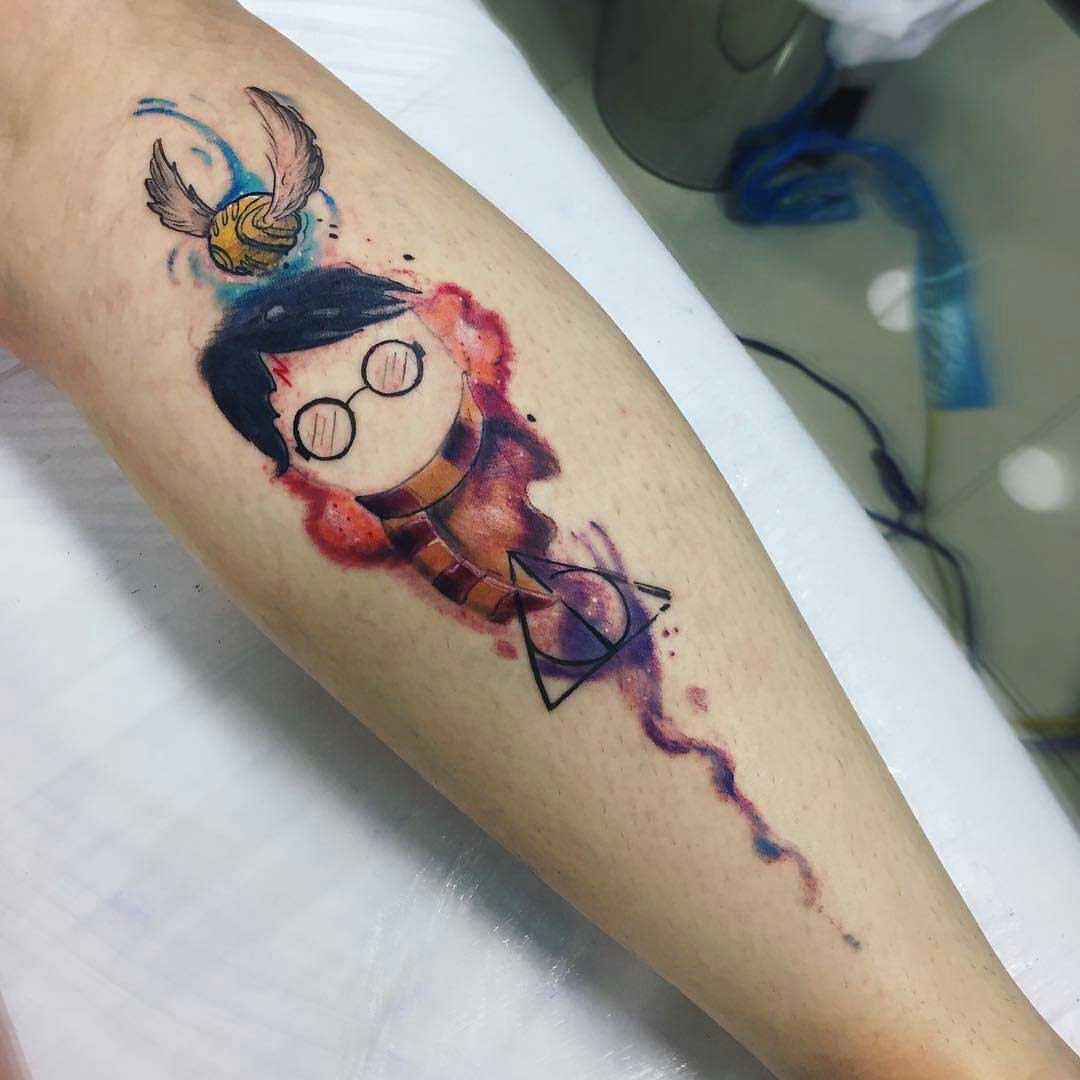 watercolor harry potter tattoo on arm