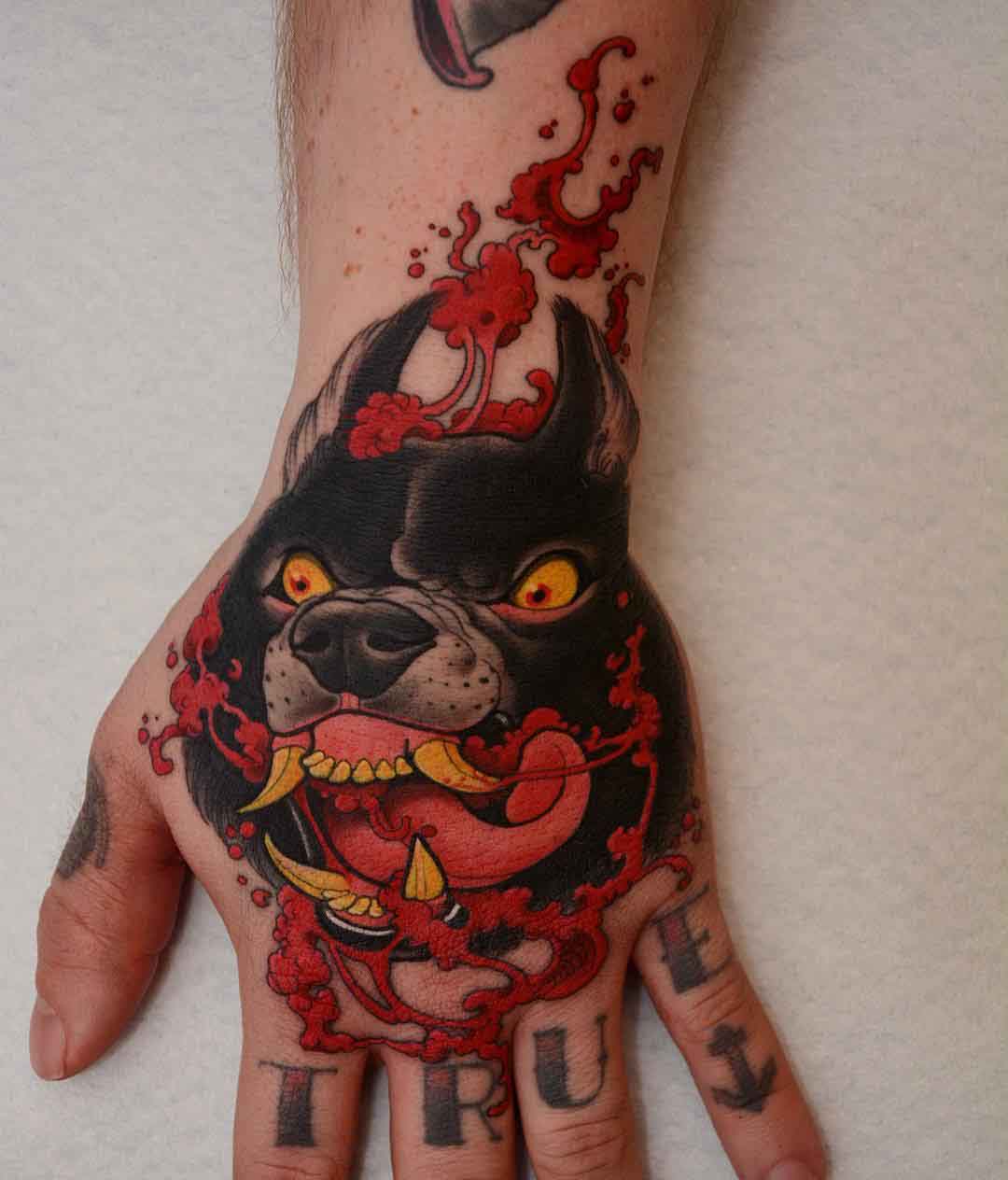hand tattoo mad dog