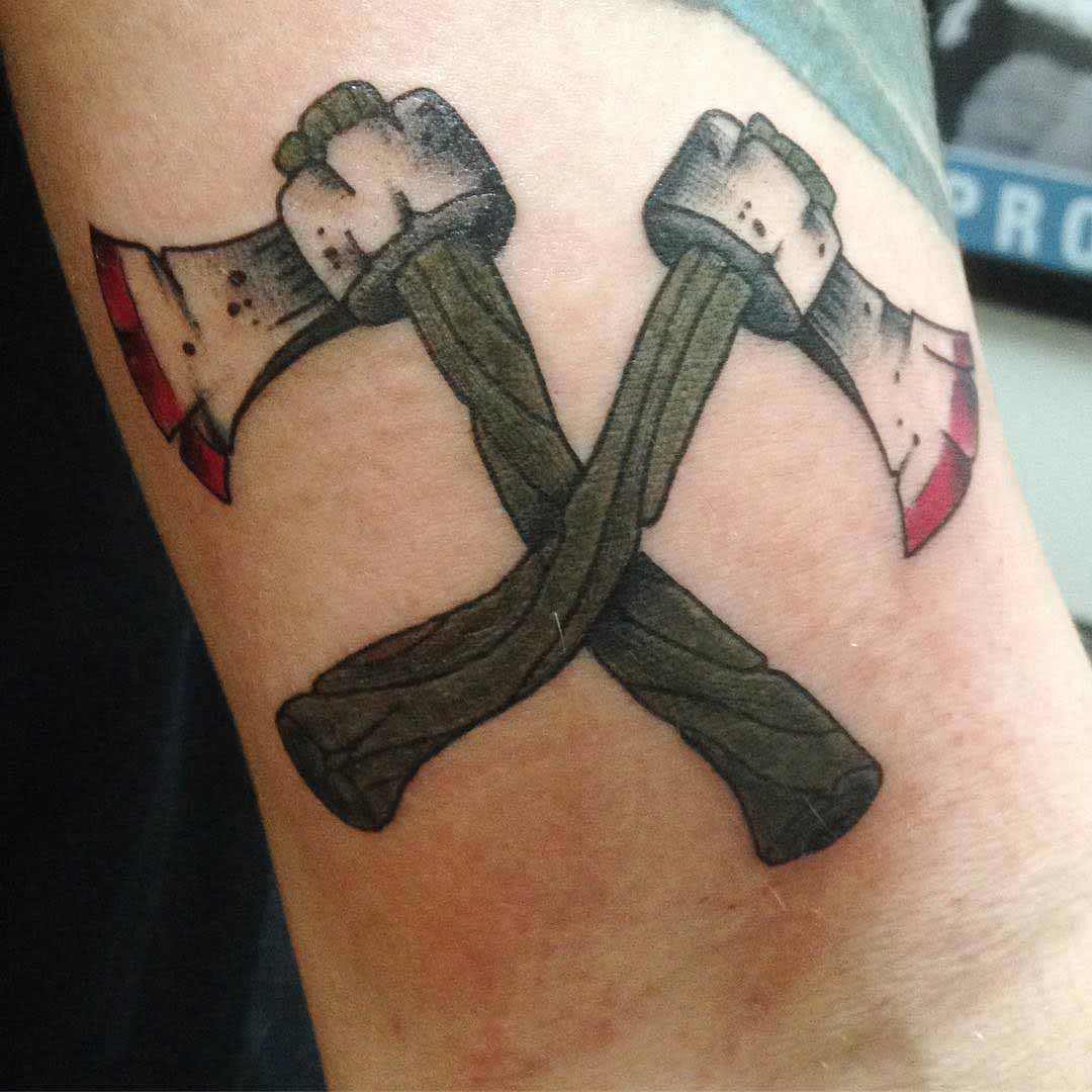 two crossed axes tattoo