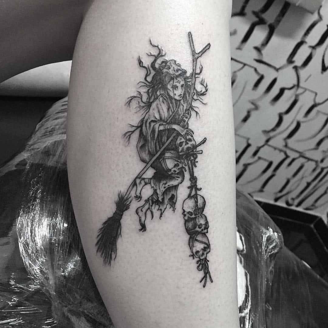 tattoo of witch with skulls