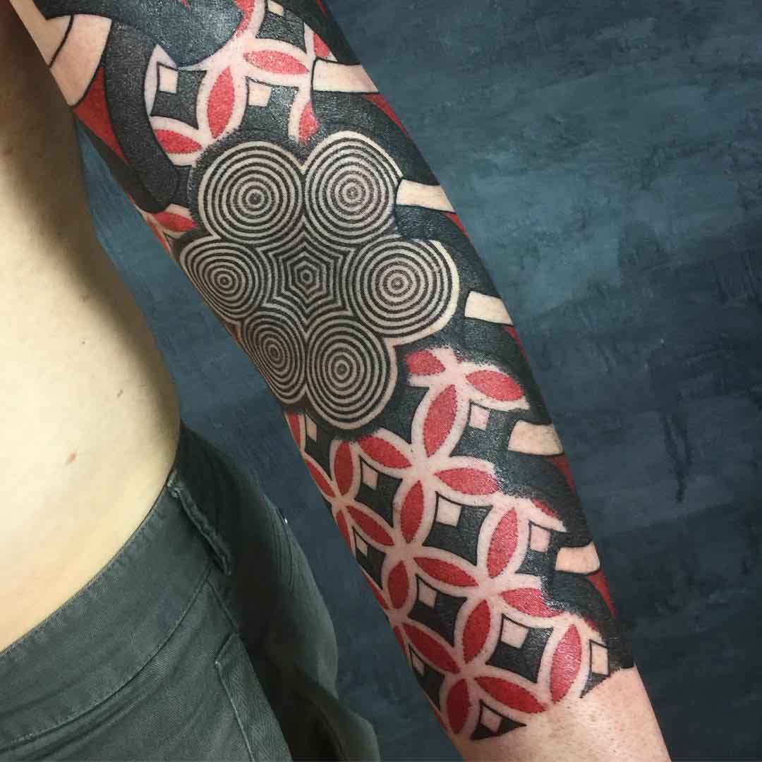 geometry tattoo on inner elbow on arm