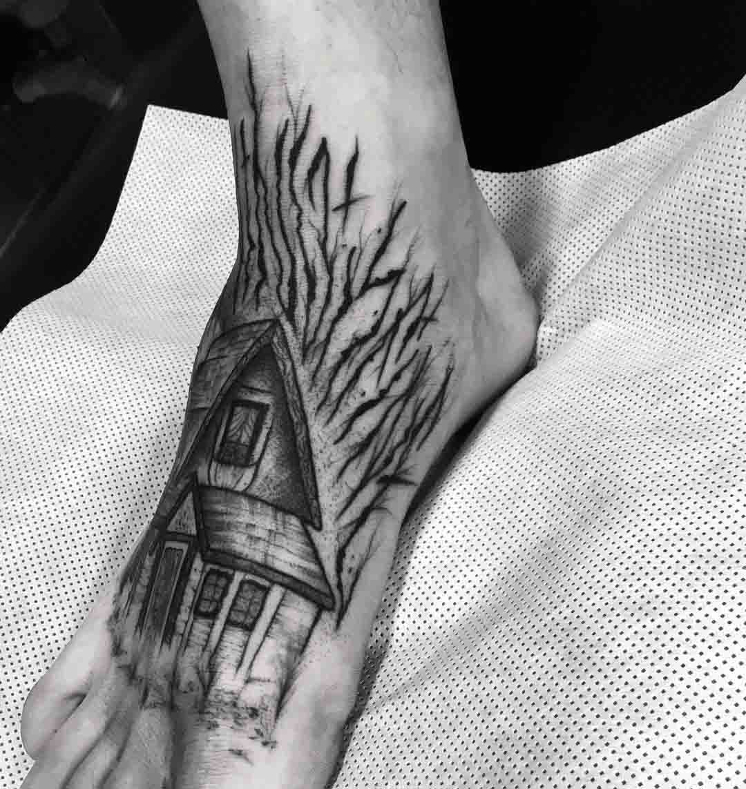 house tattoo on foot