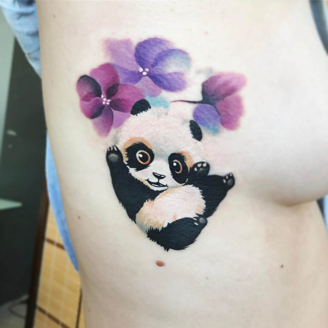 cute panda tattoo with balloons on ribs