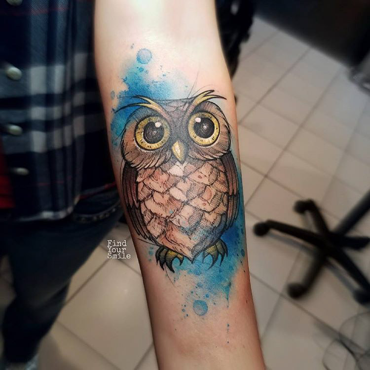 cute owl tattoo on arm