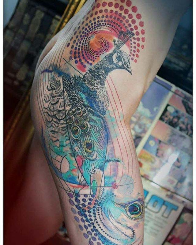 peacock tattoo on hip side