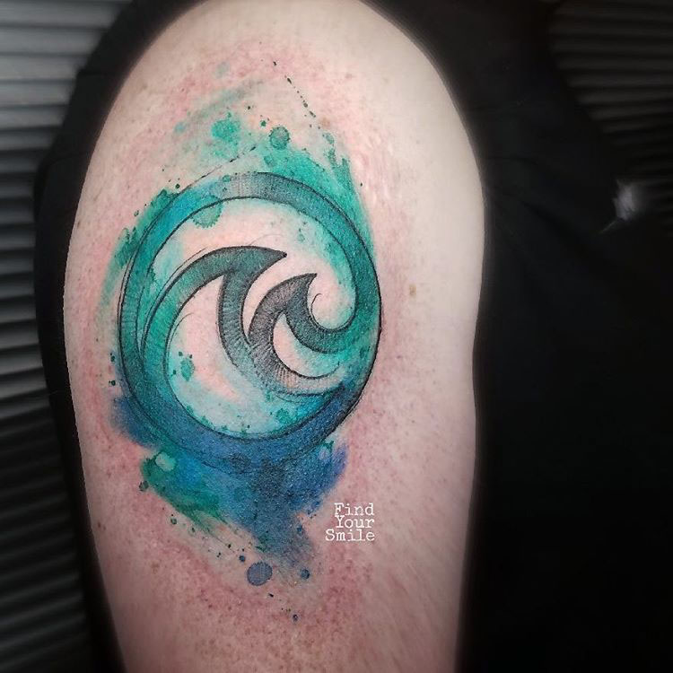 disney themed tattoo the living seas emblem