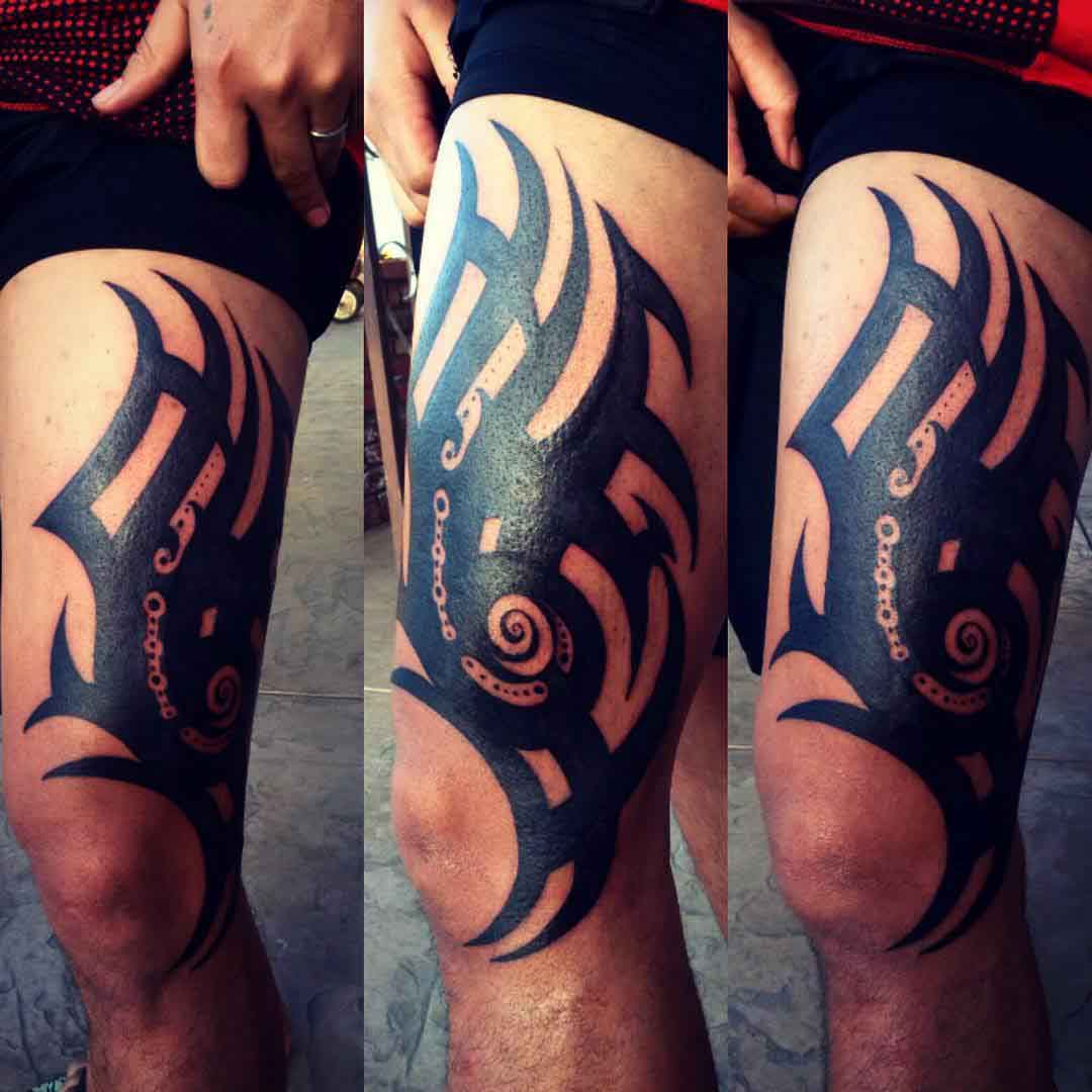 thigh tattoo tribal style