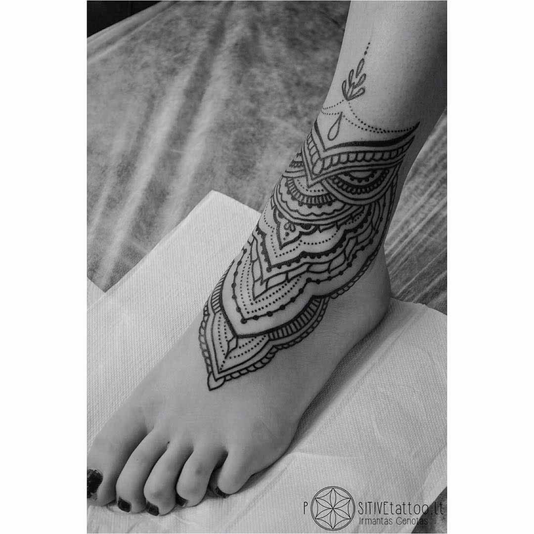 mehendi tattoo on foot and ankle