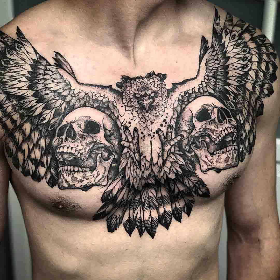chest tattoo skulls and bird