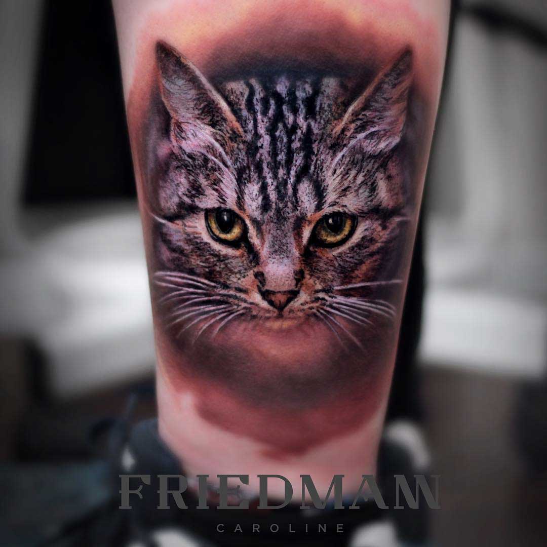 realistic cat tattoo on ankle