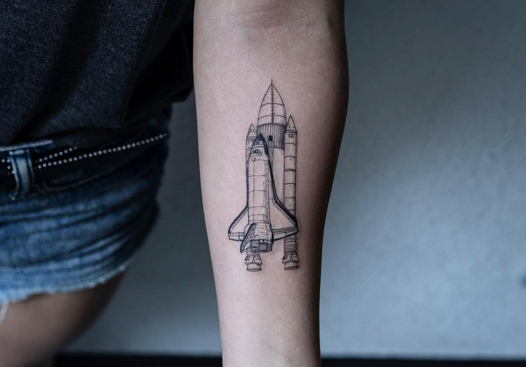 space shuttle tattoo on arm