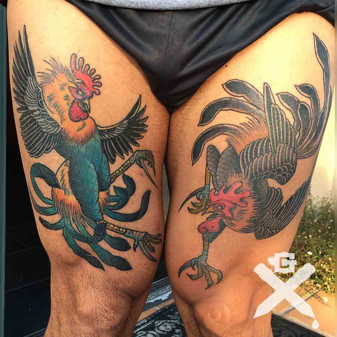 thigh tattoos fighting roosters