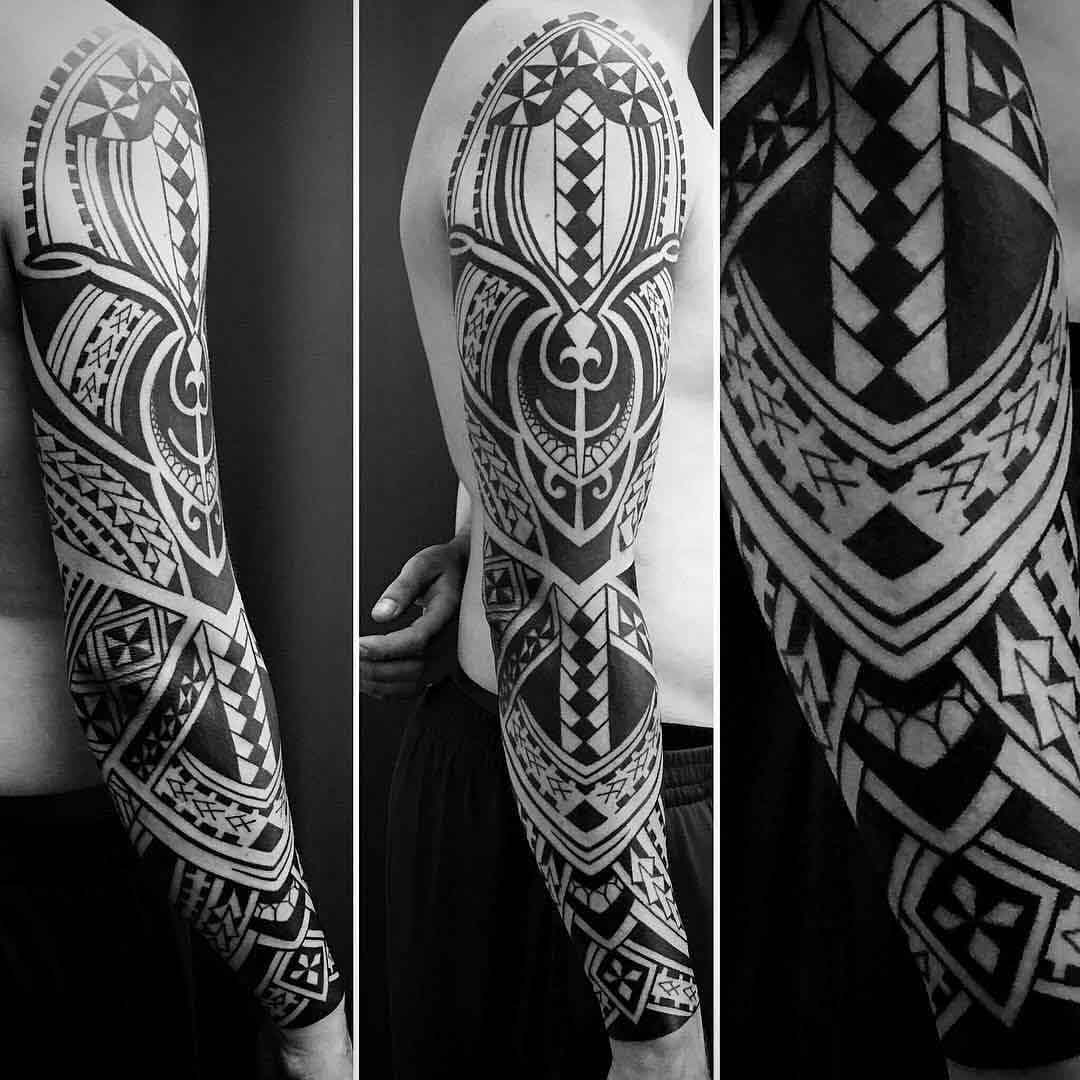 polynesian tattoo sleeve on full arm
