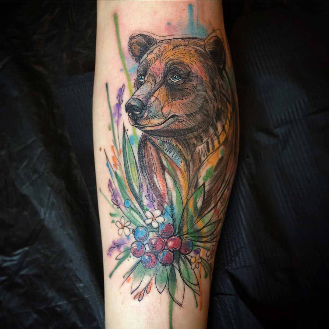 bear tattoo on arm watercolor style