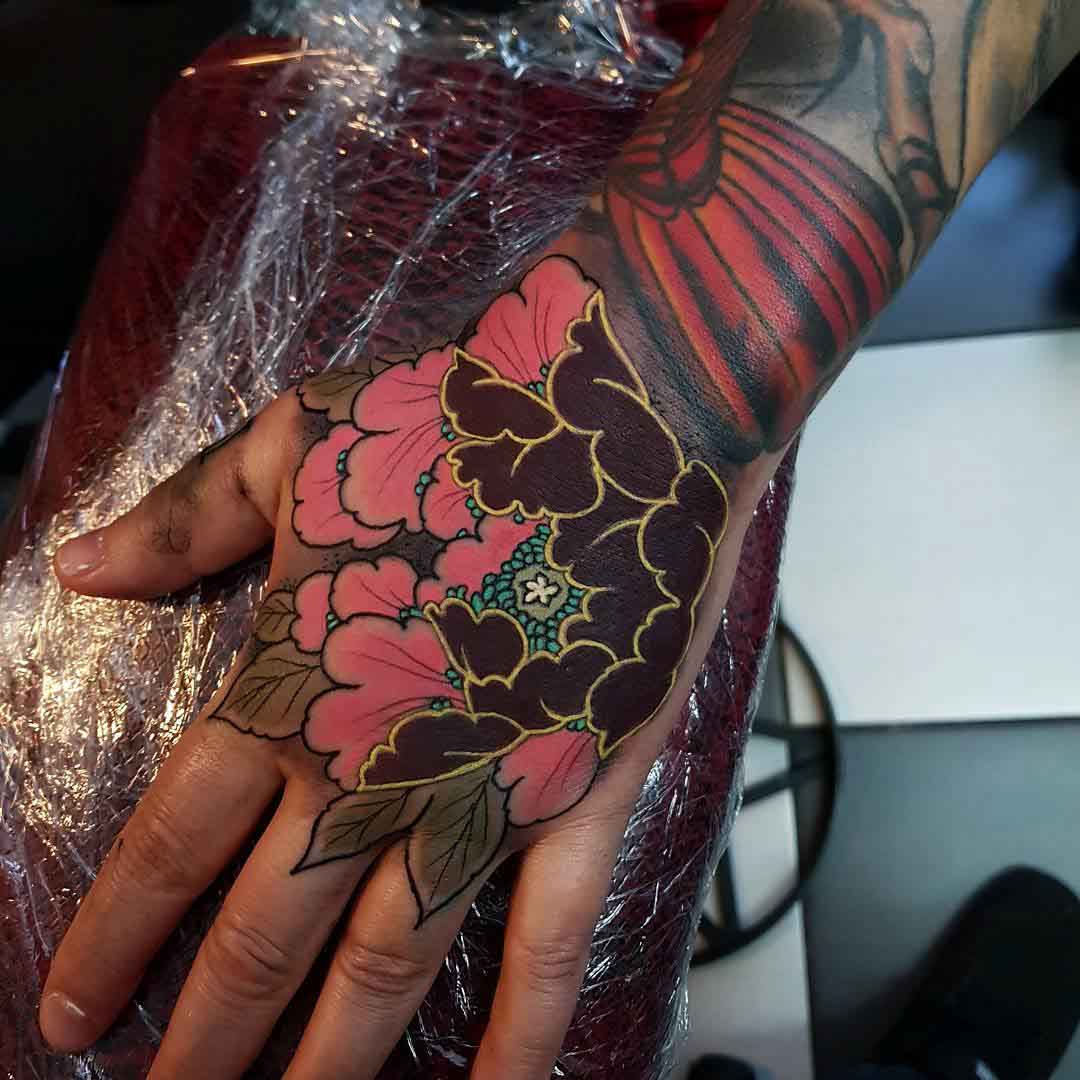hand tattoo flower oriental style