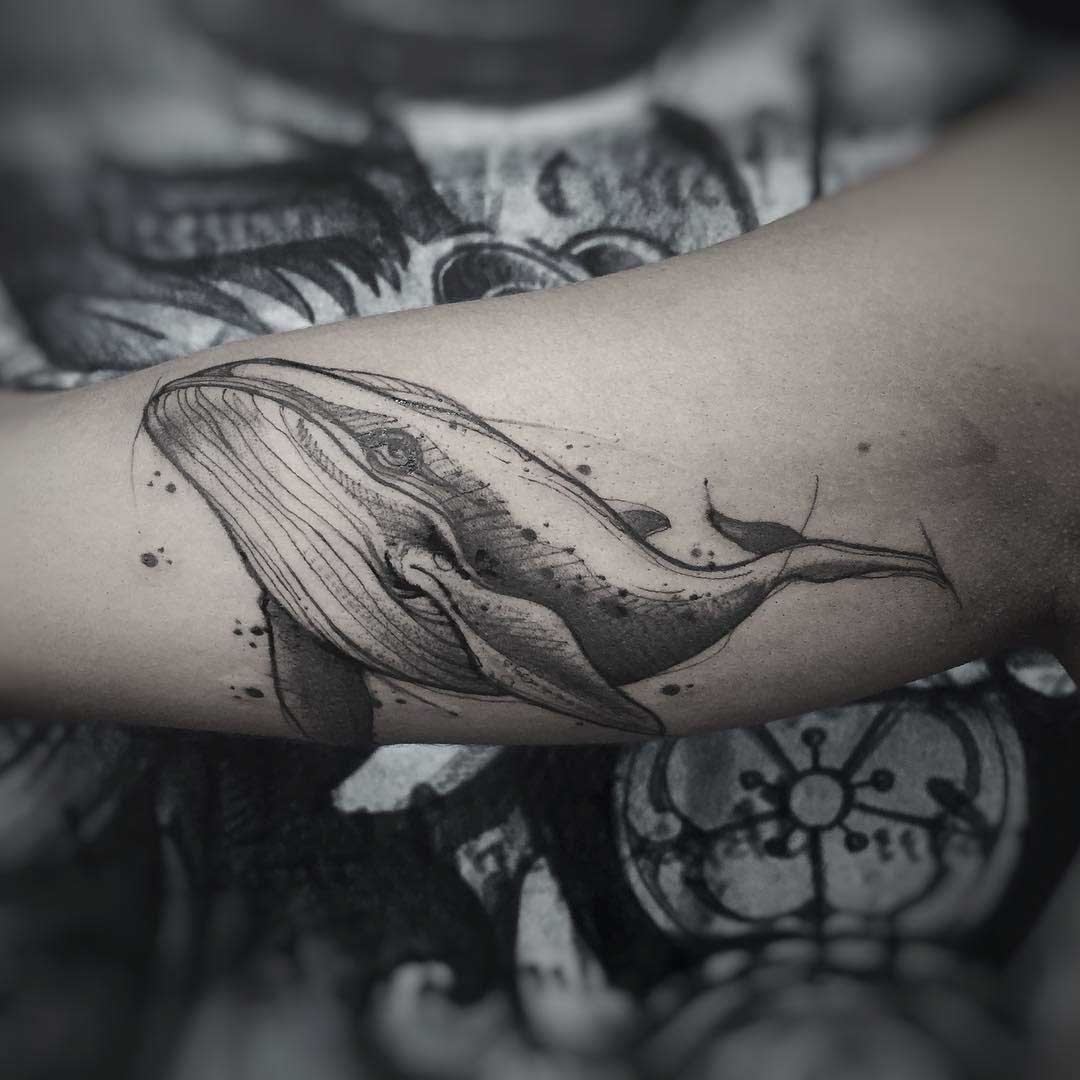blue whale tattoo on arm black and grey