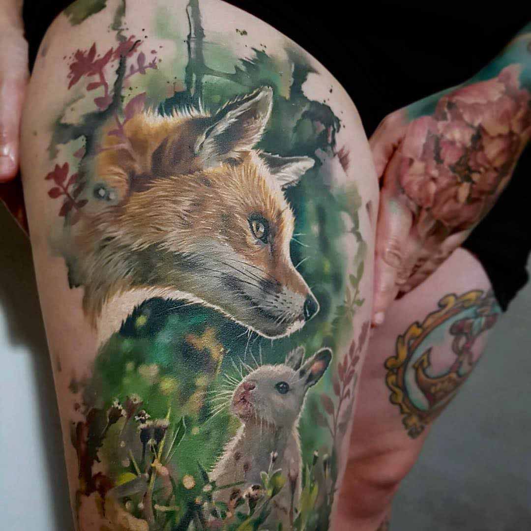 hip tattoo fox and rabbit