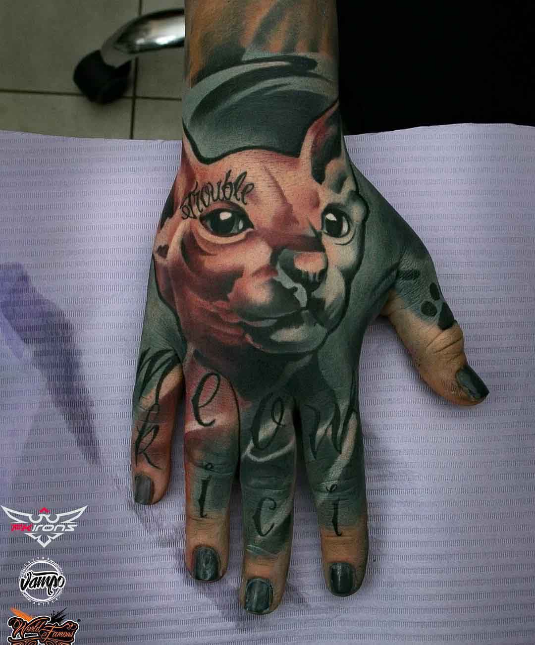 hand tattoo sphynx cat