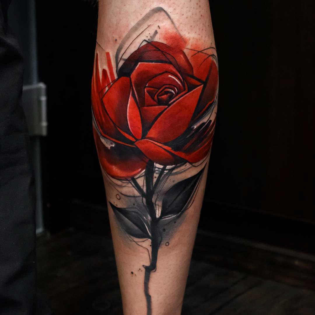calf tattoo red rose