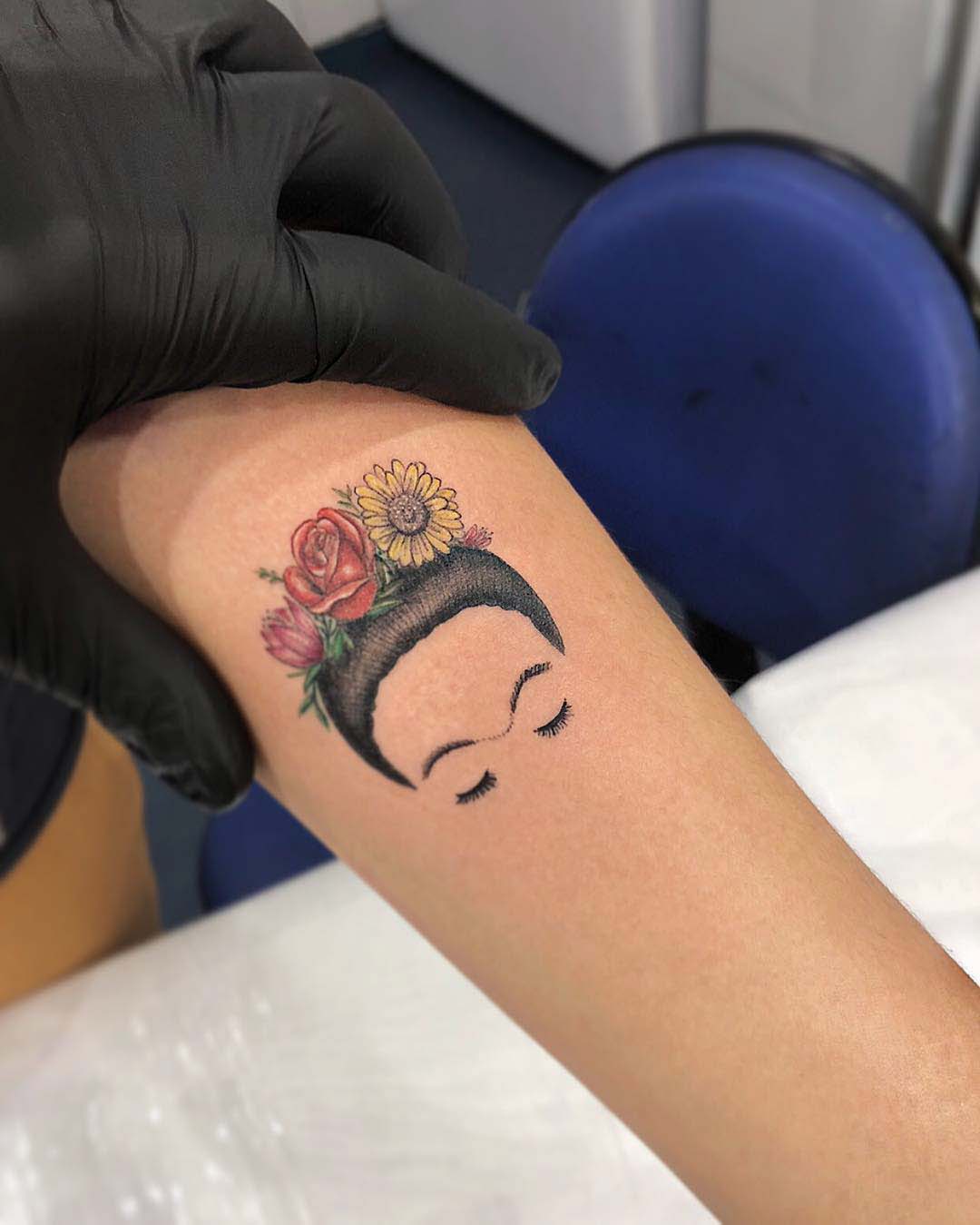 floral girl tattoo
