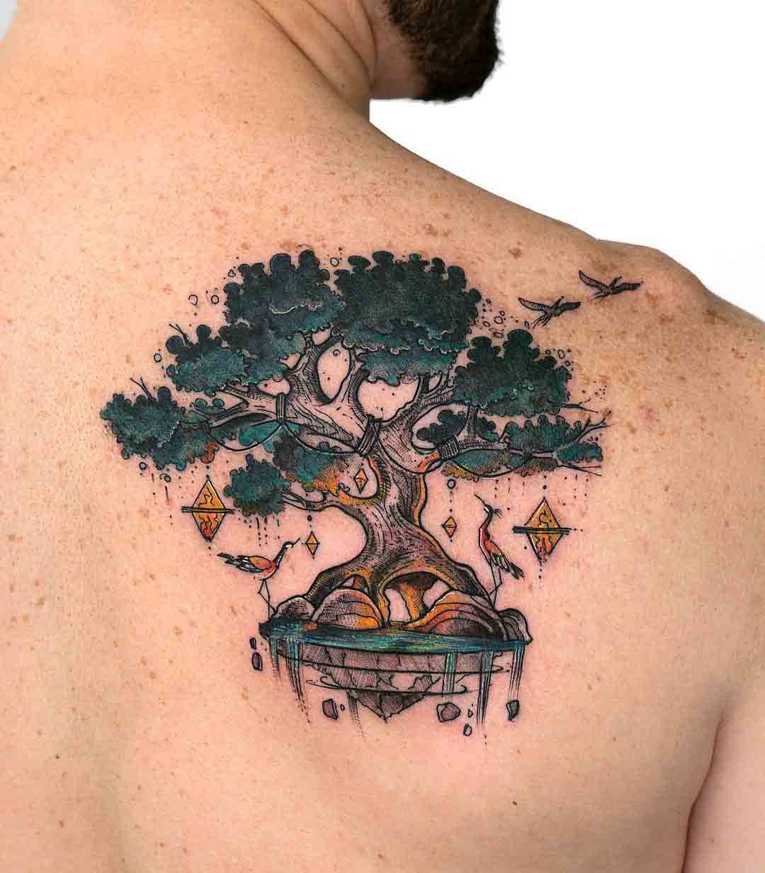 shoulder blade tree tattoo spiritual
