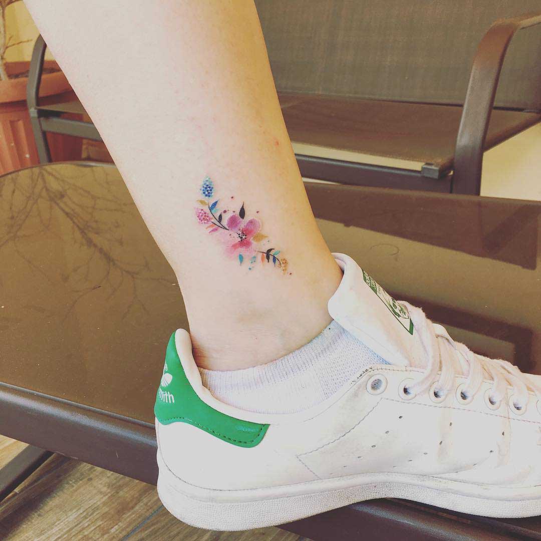 ankle tattoo flowers