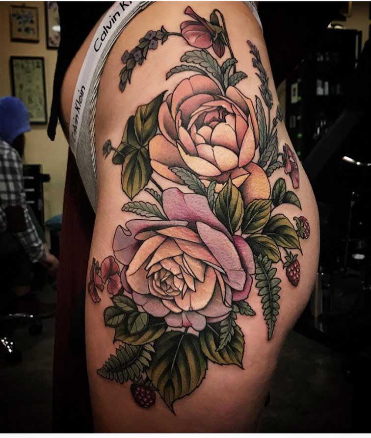 roses tattoo on hip