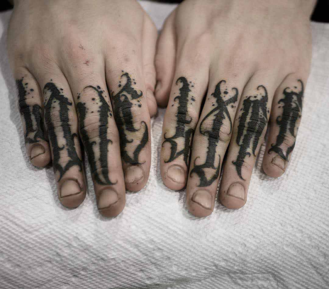 lattering tattoo on fingers love life
