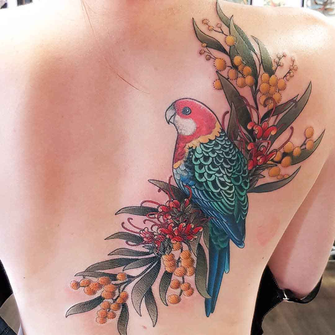 back tattoo parrot with flowers