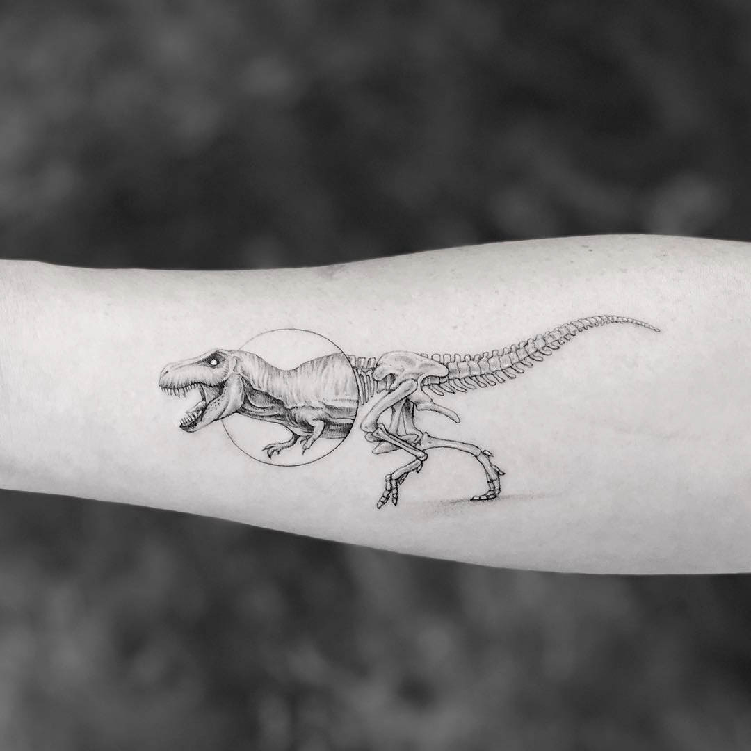 T-rex skeleton tattoo on arm
