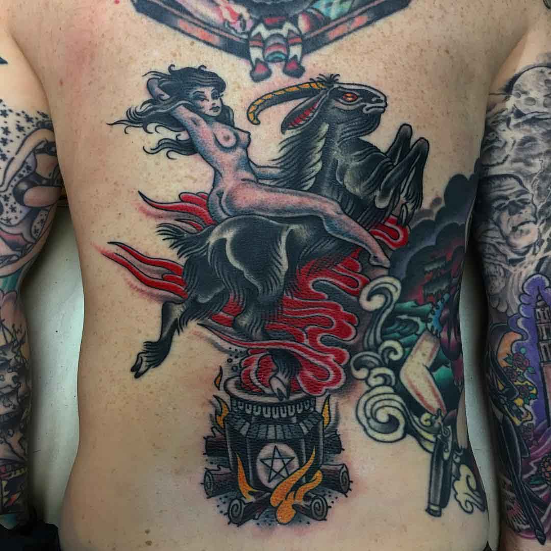 traditional tattoo witch on a goat