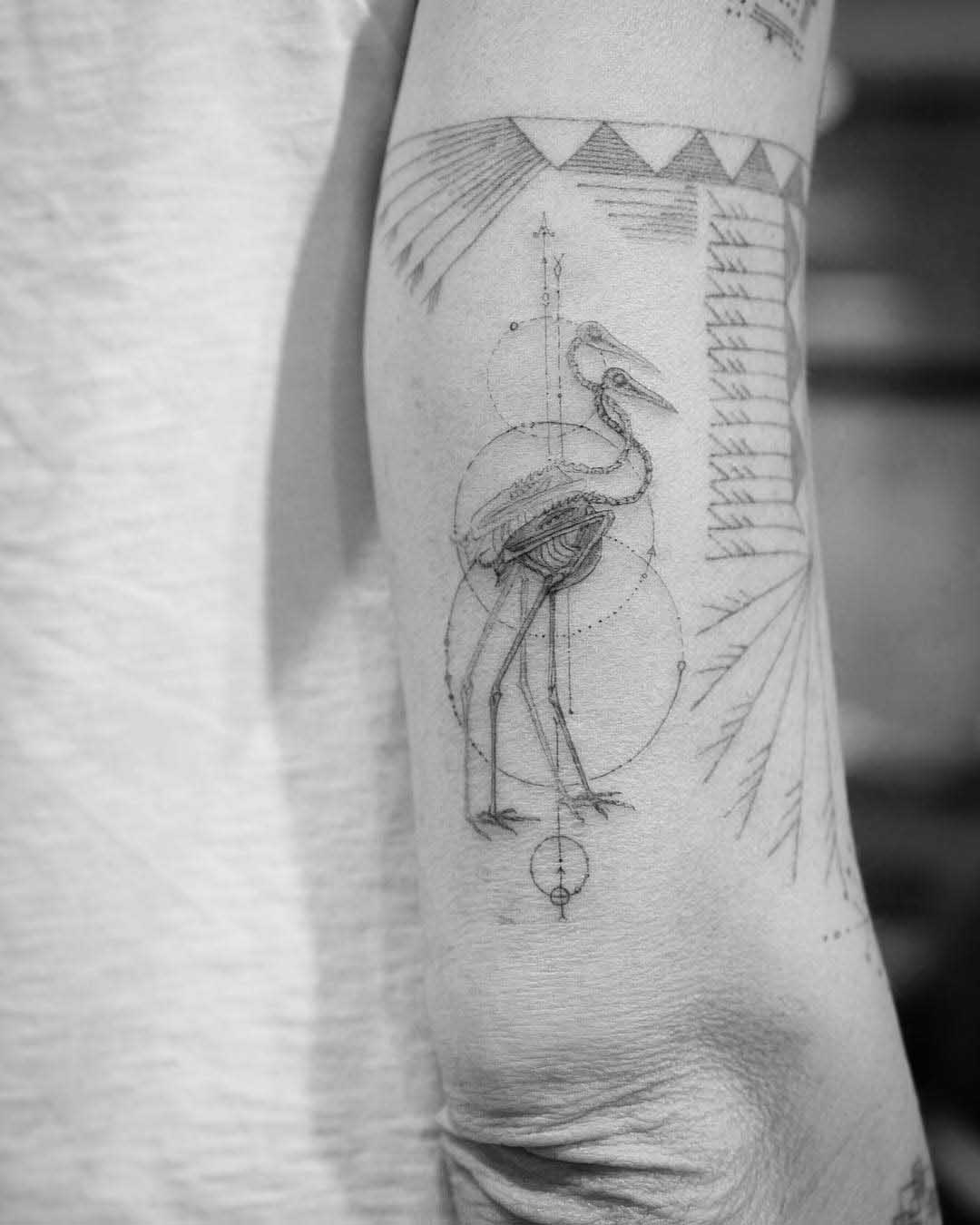skeleton crane tattoo