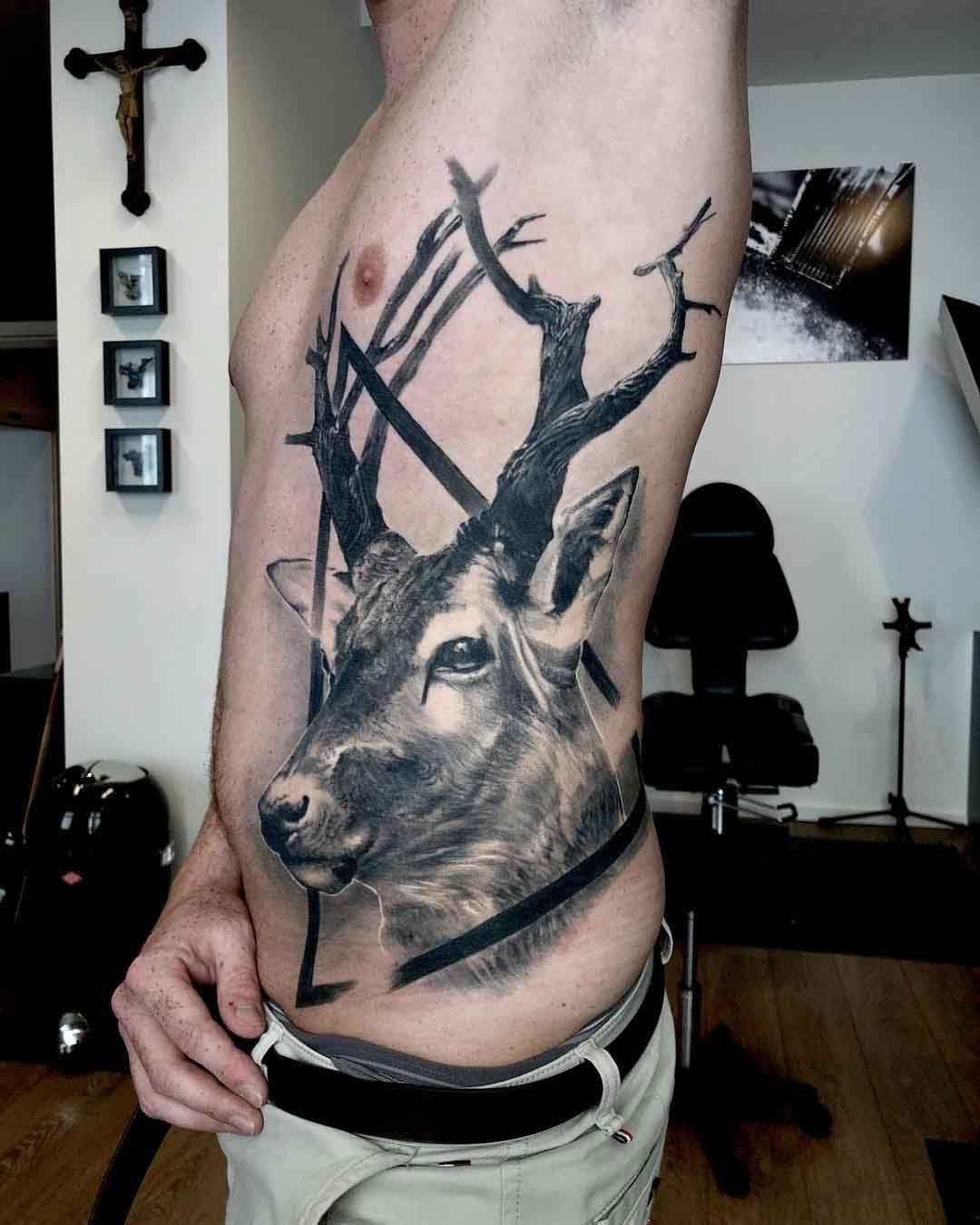 torso side tattoo deer