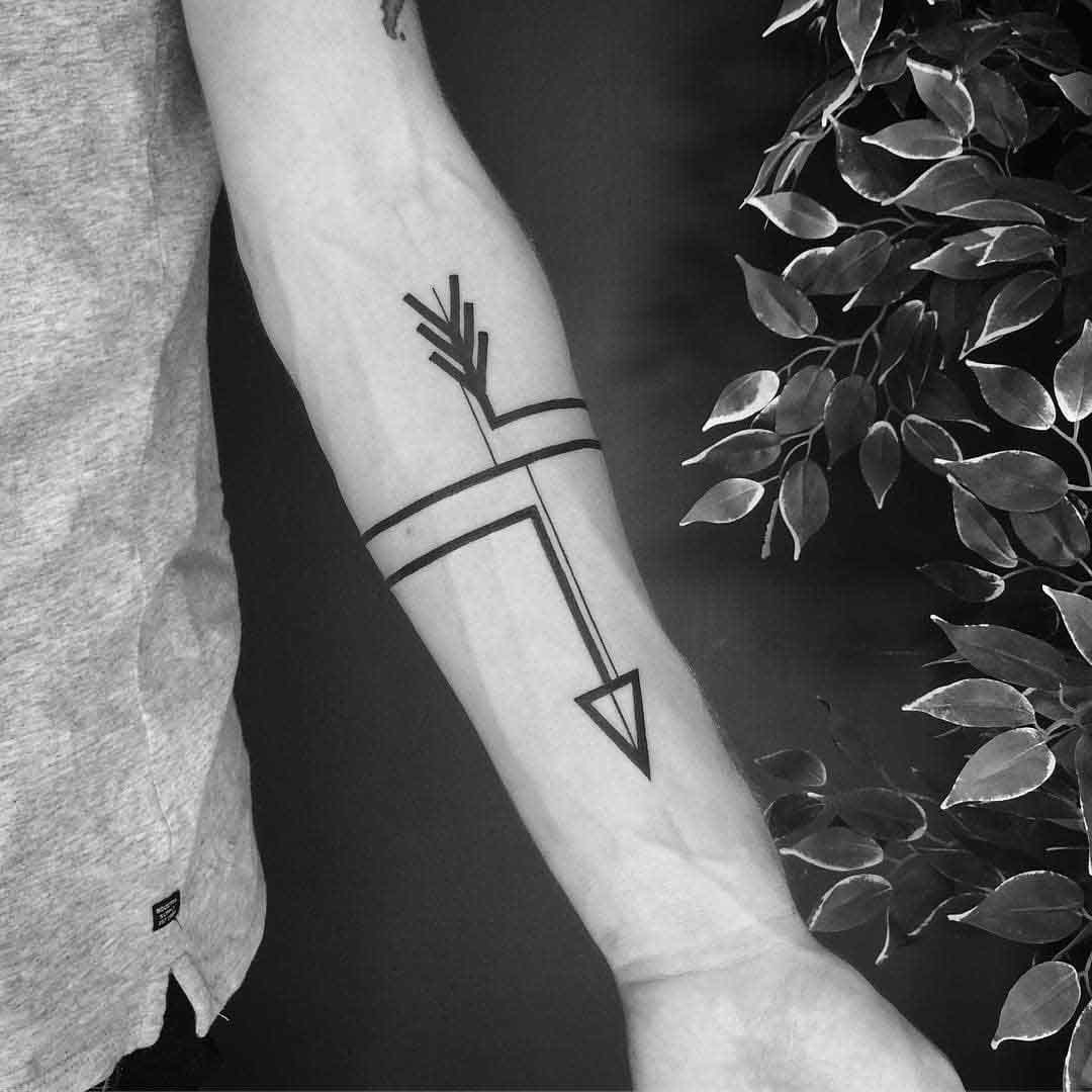 black geometric arrow tattoo