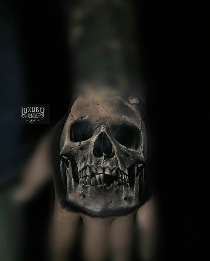 skull tattoo on hand