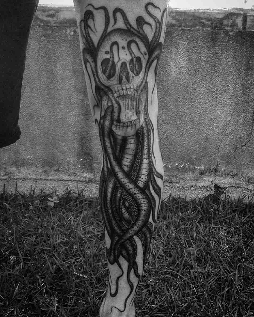 leg tattoo octopus skull